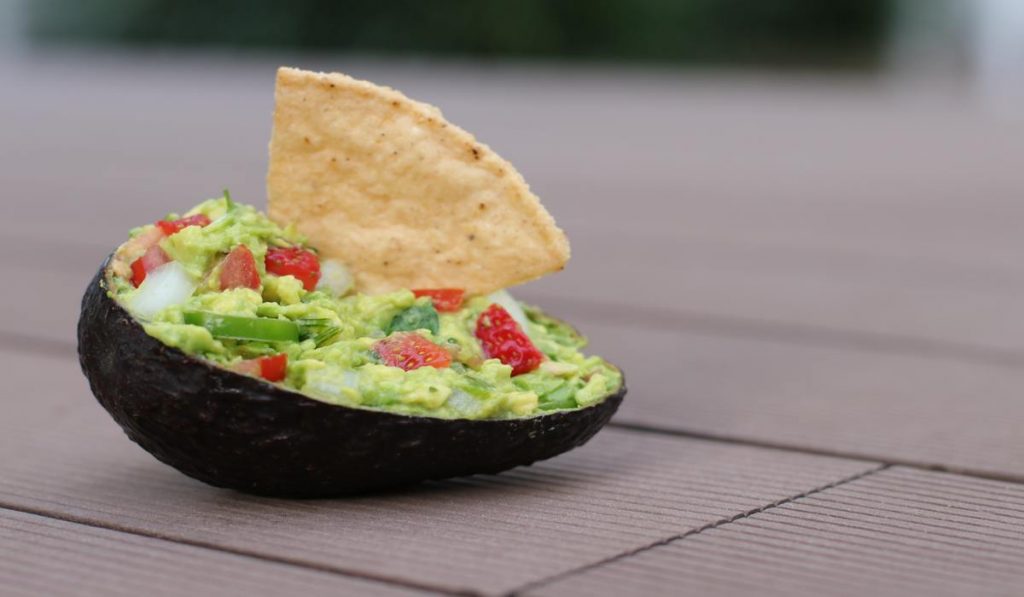 There are several ways you can use to try avocado as a boat. One is you can remove the pit and fill your favorite topping in it